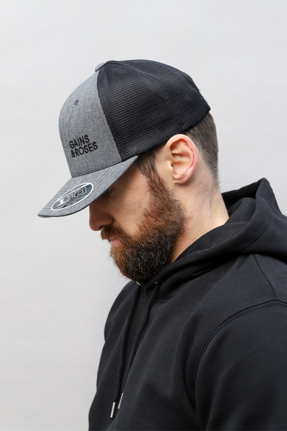 Grey and cheap black trucker cap